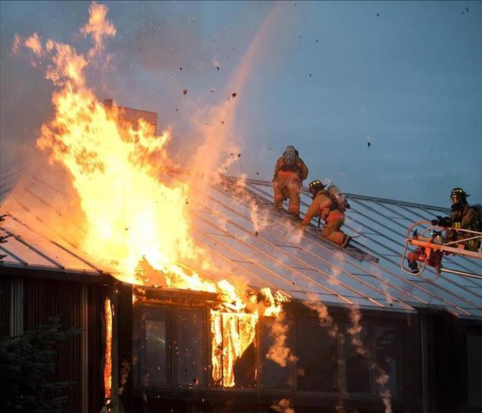 fire and flames on house roof